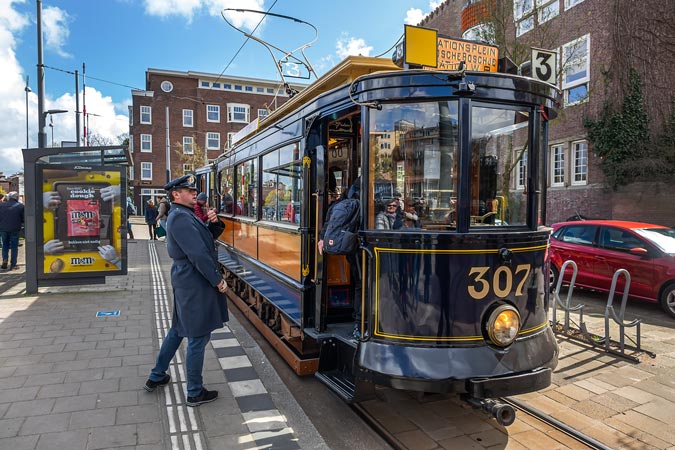 Amsterdam. Both modern and historical trams on route.